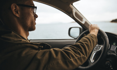 man-with-glasses-driving