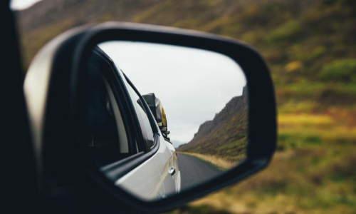 rear-view-mirror-on-highway