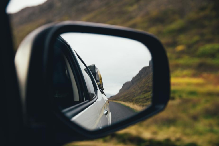 rear-view-mirror-on-highway