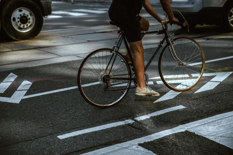 man-riding-in-city-bike-lane