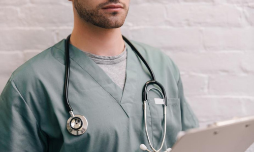 male-doctor-with-stethoscope-and-clipboard