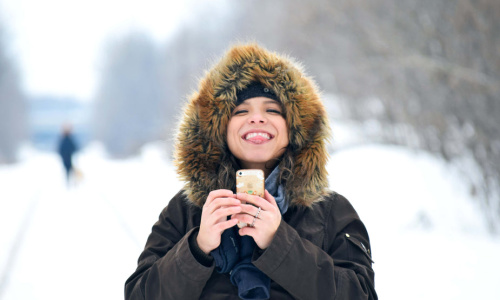 person-bundled-for-winter-sticks-out-tongue