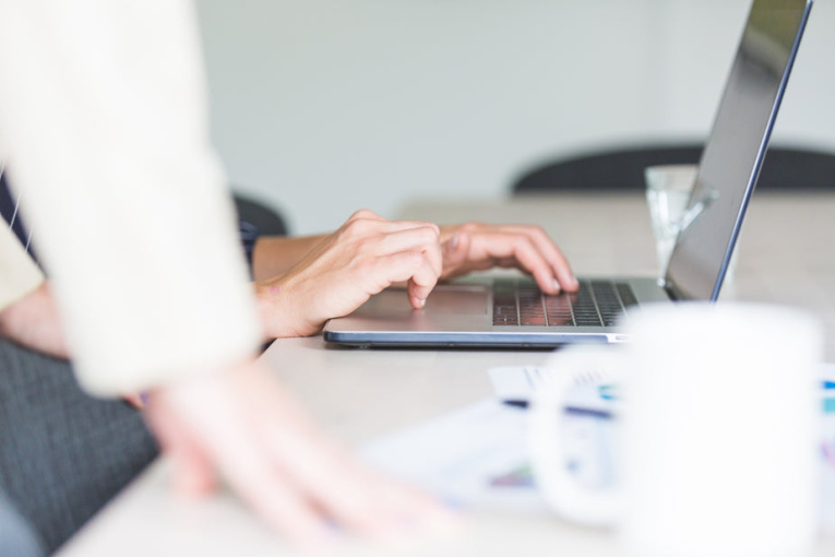 hands-using-computer-in-office